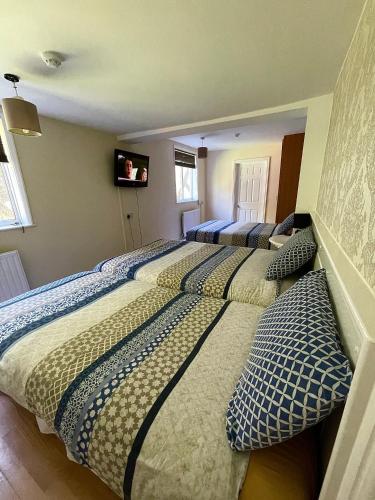 Ένα ή περισσότερα κρεβάτια σε δωμάτιο στο Bramley House