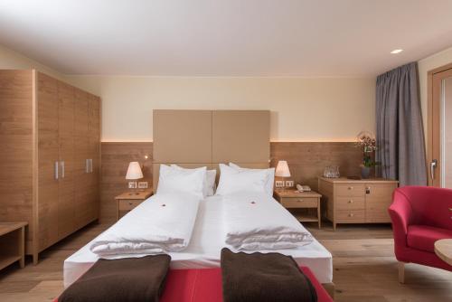 Postel nebo postele na pokoji v ubytování Hotel Ansitz Kematen ***S