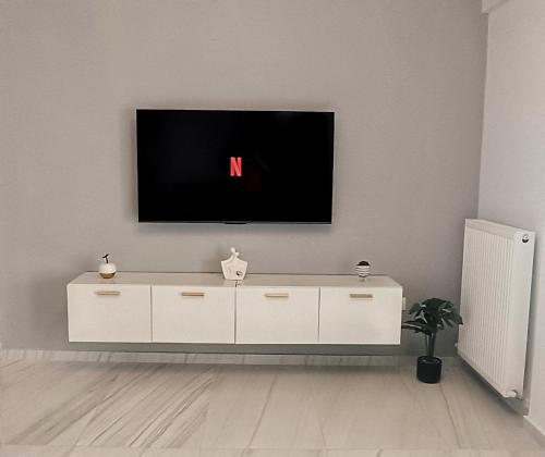 Comfort Corner 75m2 100Mbs tesisinde bir televizyon ve/veya eğlence merkezi