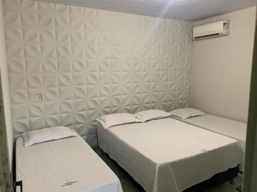 Posteľ alebo postele v izbe v ubytovaní Hotel Imigrantes - Várzea Grande