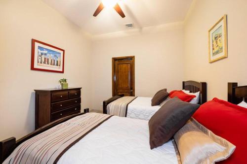 Giường trong phòng chung tại Villa Pura Vida - Ocotal