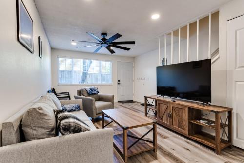 a living room with a large flat screen tv at Retreat near UO, Autzen Stadium, Amazon Park (# 1) in Eugene