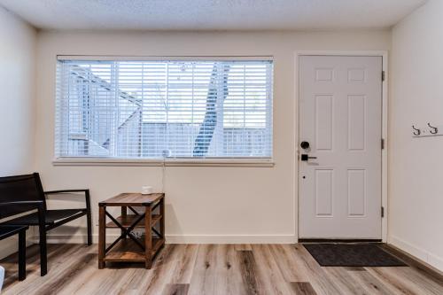 a room with a white door and a window at Retreat near UO, Autzen Stadium, Amazon Park (# 1) in Eugene