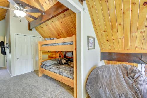 a bedroom with two bunk beds in a house at Less Than 2 Mi to Dtwn Prescott Cabin with Furnished Deck in Prescott