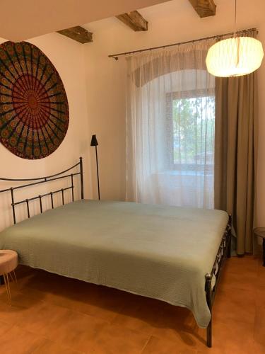 Postel nebo postele na pokoji v ubytování Terracotta