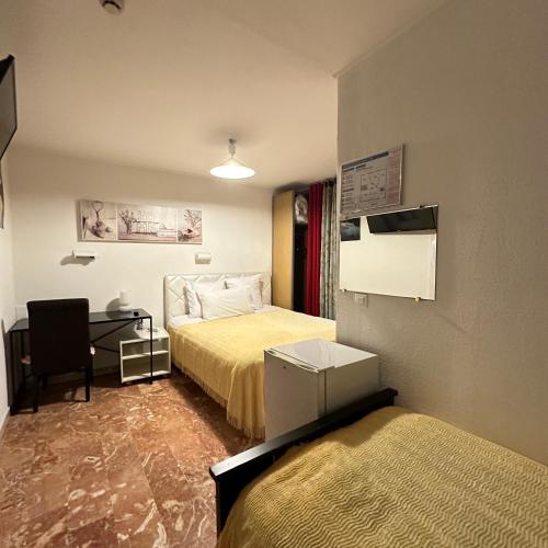 Katil atau katil-katil dalam bilik di Hotel Paris Star