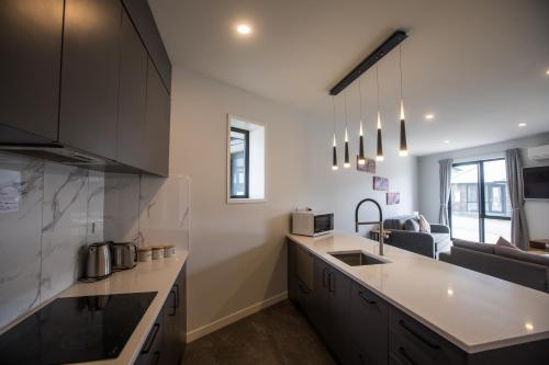 a kitchen with a sink and a counter top at Skyblue Tekapo in Lake Tekapo