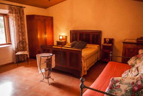 Postel nebo postele na pokoji v ubytování Fattoria dei Cavalieri