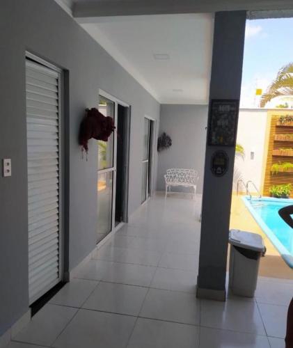 a hallway of a house with a swimming pool at Casa de praia - RIO GRANDE DO NORTE - TIBAU DO SUL in Pipa