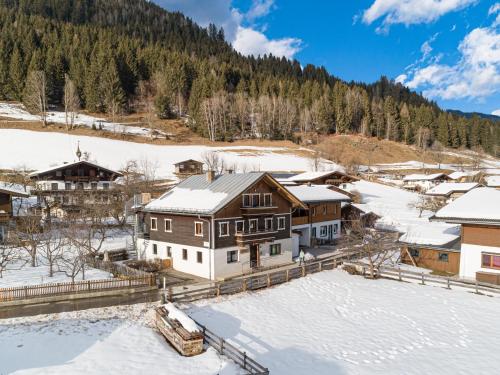 an aerial view of a house in the snow at Kitzbüheler Alpen XL in Bramberg am Wildkogel