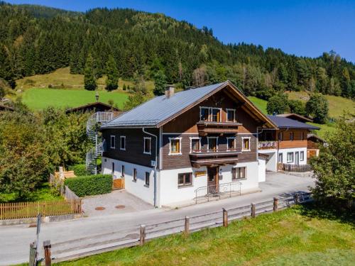 an aerial view of a house in the mountains at Kitzbüheler Alpen XL in Bramberg am Wildkogel
