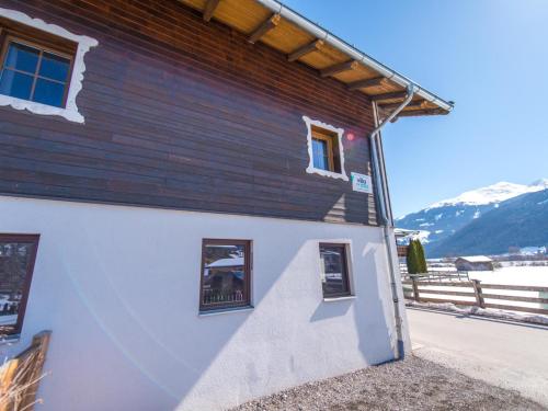 a building with windows on the side of it at Kitzbüheler Alpen XL in Bramberg am Wildkogel