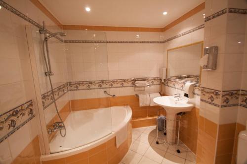 Ένα μπάνιο στο Chambre d'hôtes La Potinière