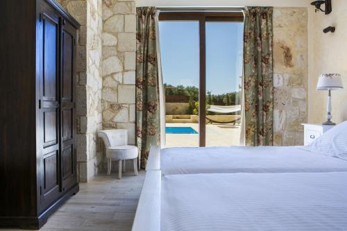 A bed or beds in a room at Villa Ydria