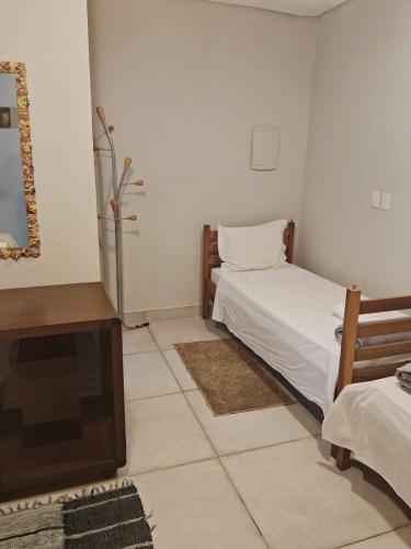 Postel nebo postele na pokoji v ubytování Pousada Luar