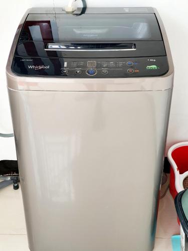 a toaster oven sitting on top of a refrigerator at Furnished House in Calapan City Subdivision near ROBINSONS Mall L33 in Calapan