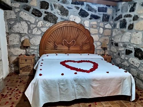 Postel nebo postele na pokoji v ubytování Cabañas Los Cactus