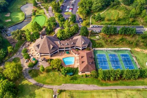 an aerial view of a house with a solar array at Rest Haven in Branson West