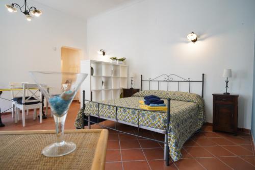 A bed or beds in a room at Casa Fabio