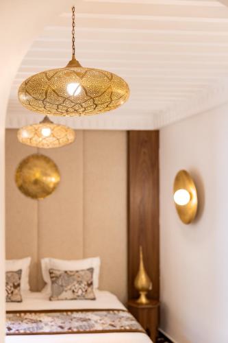 Letto o letti in una camera di Riad Nyla Wellness and Spa