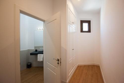 Et badeværelse på Apartamentos Setas Center