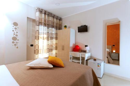 Ένα ή περισσότερα κρεβάτια σε δωμάτιο στο B&B Relax in Pompei