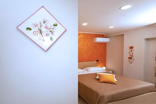Ένα ή περισσότερα κρεβάτια σε δωμάτιο στο B&B Relax in Pompei