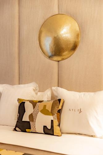 Letto o letti in una camera di Riad Nyla Wellness and Spa