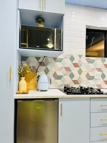 Η κουζίνα ή μικρή κουζίνα στο Modern studio apartments