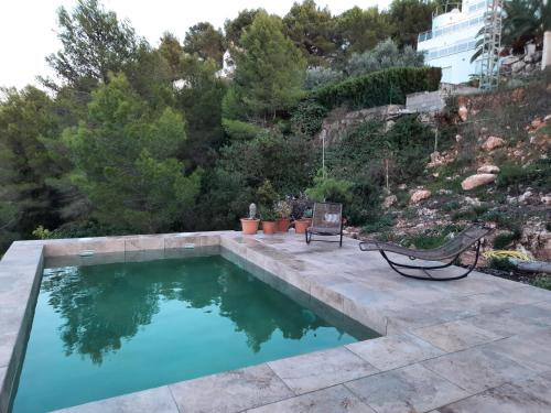 Bazén v ubytovaní GAUDIR LA MAR - Casa en Tossal Gros La Font d'en Carros alebo v jeho blízkosti
