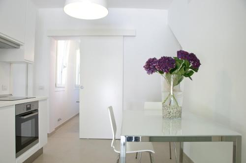 Kuchyň nebo kuchyňský kout v ubytování Eco Apartments Cervia