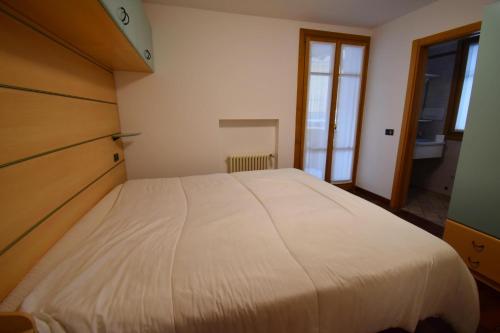 Ένα ή περισσότερα κρεβάτια σε δωμάτιο στο Excelsior Central Apartment
