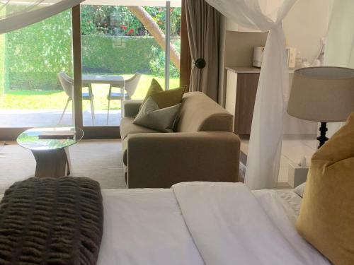 Letto o letti in una camera di The Leslie Executive Hotel