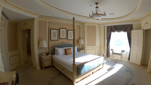 a large bedroom with a bed and a window at Westgate in Las Vegas