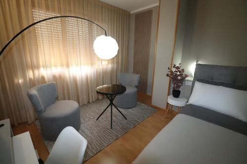 Una cama o camas en una habitación de Hotel Rio Umbertide