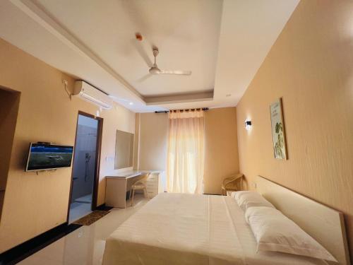 Postel nebo postele na pokoji v ubytování Nilawin Hotels & Resorts
