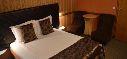 Postel nebo postele na pokoji v ubytování Family Hotel Yagoda88