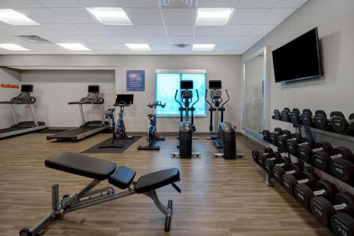 a gym with several treadmills and exercise bikes at Hampton Inn Lakeville Minneapolis, Mn in Lakeville