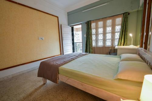 Cama ou camas em um quarto em HomeSlice Mauj Mansion, Villa in JP Nagar