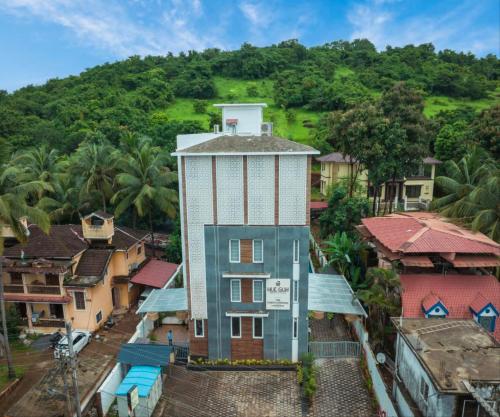 an overhead view of a building in a village at HUE GUH The Porto Candolim in Calangute