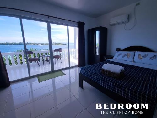 Ένα ή περισσότερα κρεβάτια σε δωμάτιο στο The Clifftop Home