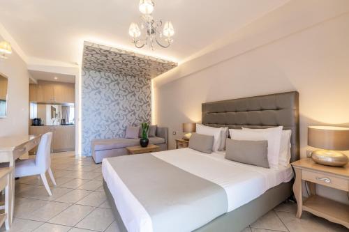 Postel nebo postele na pokoji v ubytování Balcony Boutique Hotel