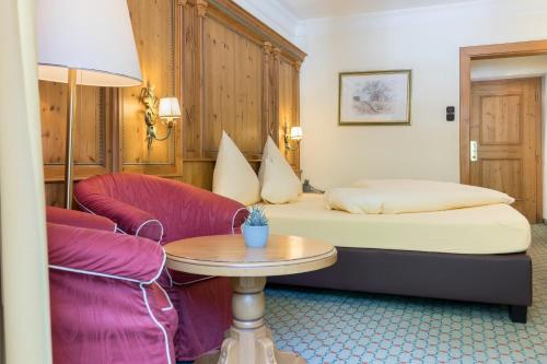 Letto o letti in una camera di Hotel Alte Post