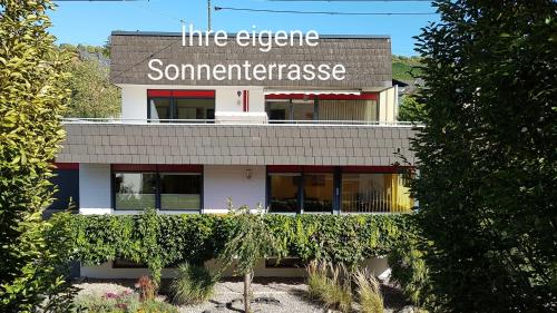 a building with a sign that reads line electric somewhere at Ferienwohnung Wagner in Neumagen-Dhron