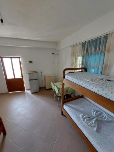 Postel nebo postele na pokoji v ubytování Jungle House