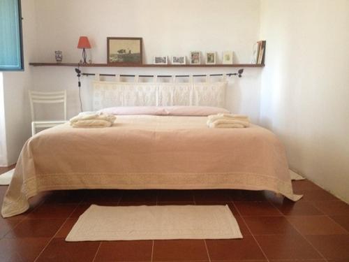 Ein Bett oder Betten in einem Zimmer der Unterkunft Holiday Home La Casetta
