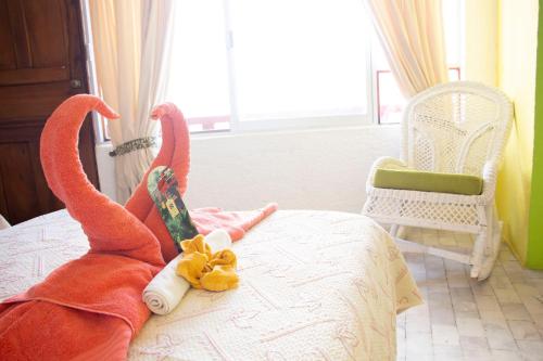 Ένα ή περισσότερα κρεβάτια σε δωμάτιο στο Hotel La Cabaña