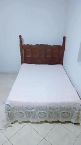 Katil atau katil-katil dalam bilik di Casa tranquila e boa localização