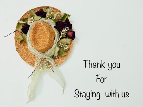 a sombrero with a bouquet of flowers on it at Wisteria in Nafpaktos