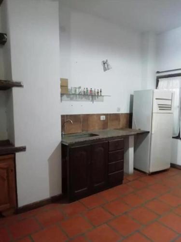 A kitchen or kitchenette at Tucana Centro